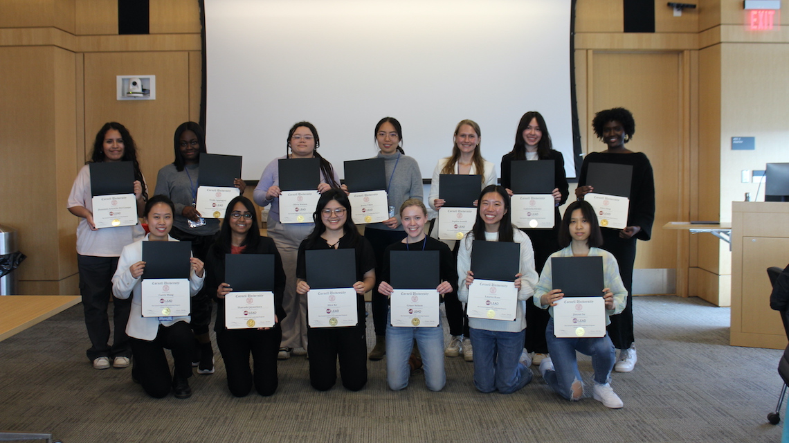 students hold certificates