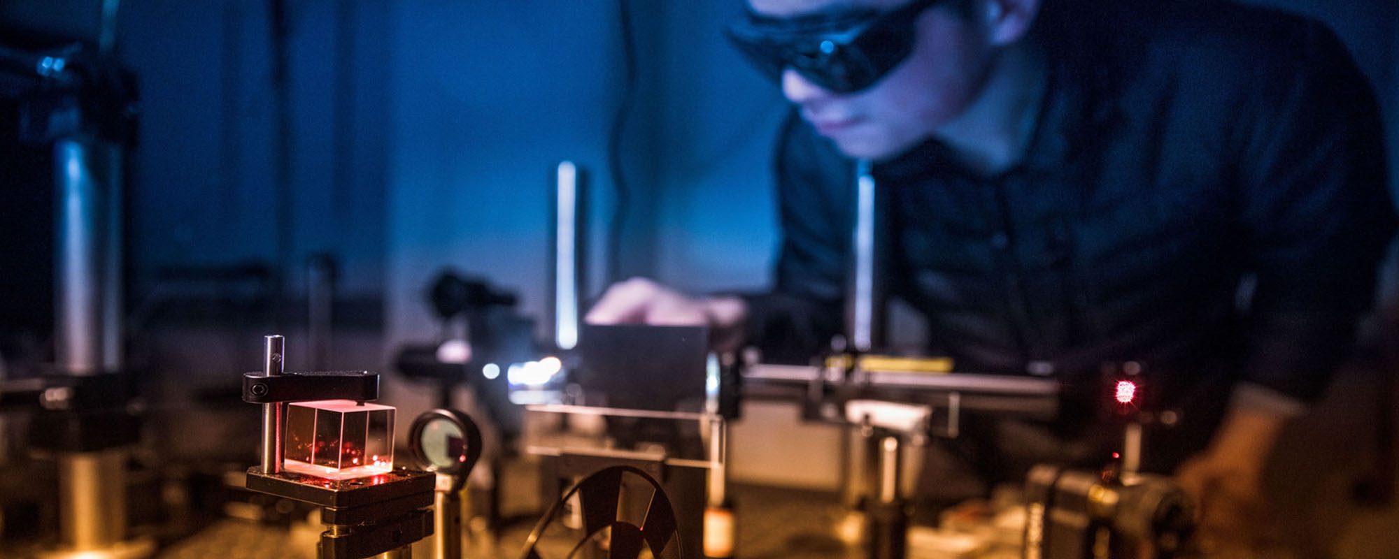 Students work in the collaborative lab of Kin Fai Mak, assistant professor of physics, and Jie Shan, professor of Applied and Engineering Physics, in the Physical Sciences Building.