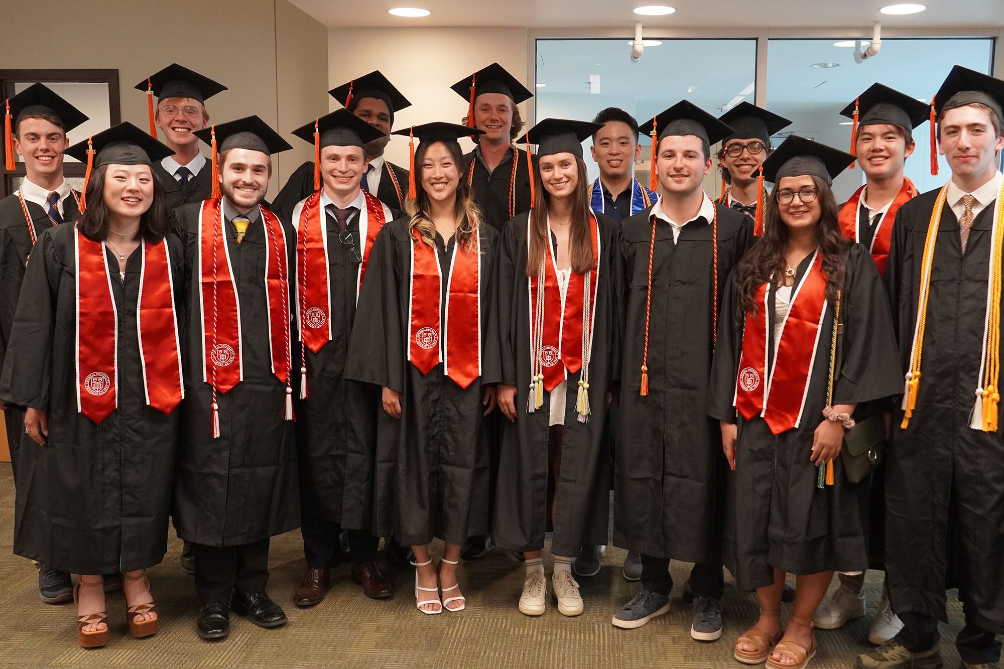 The group of all 2023 AEP undergraduates in their robes and hats