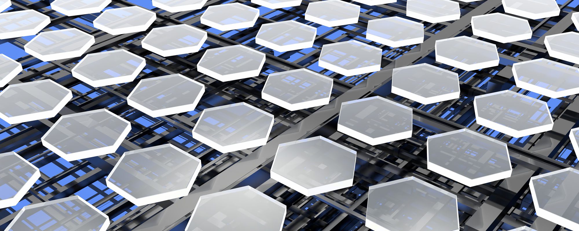 graphical representation of carbon and silicon. 3D hexagons float over computer-board image.