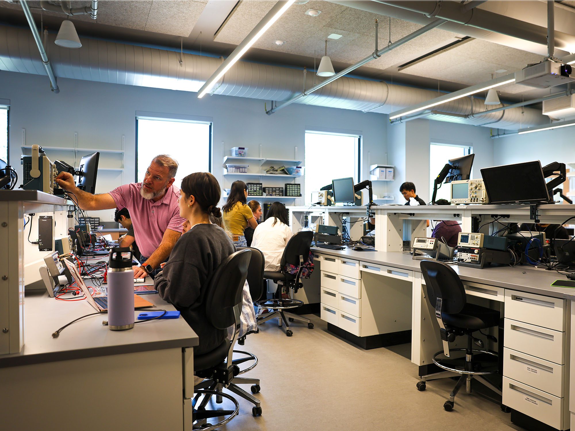 Chris Schaffer with student in Tang Hall design lab