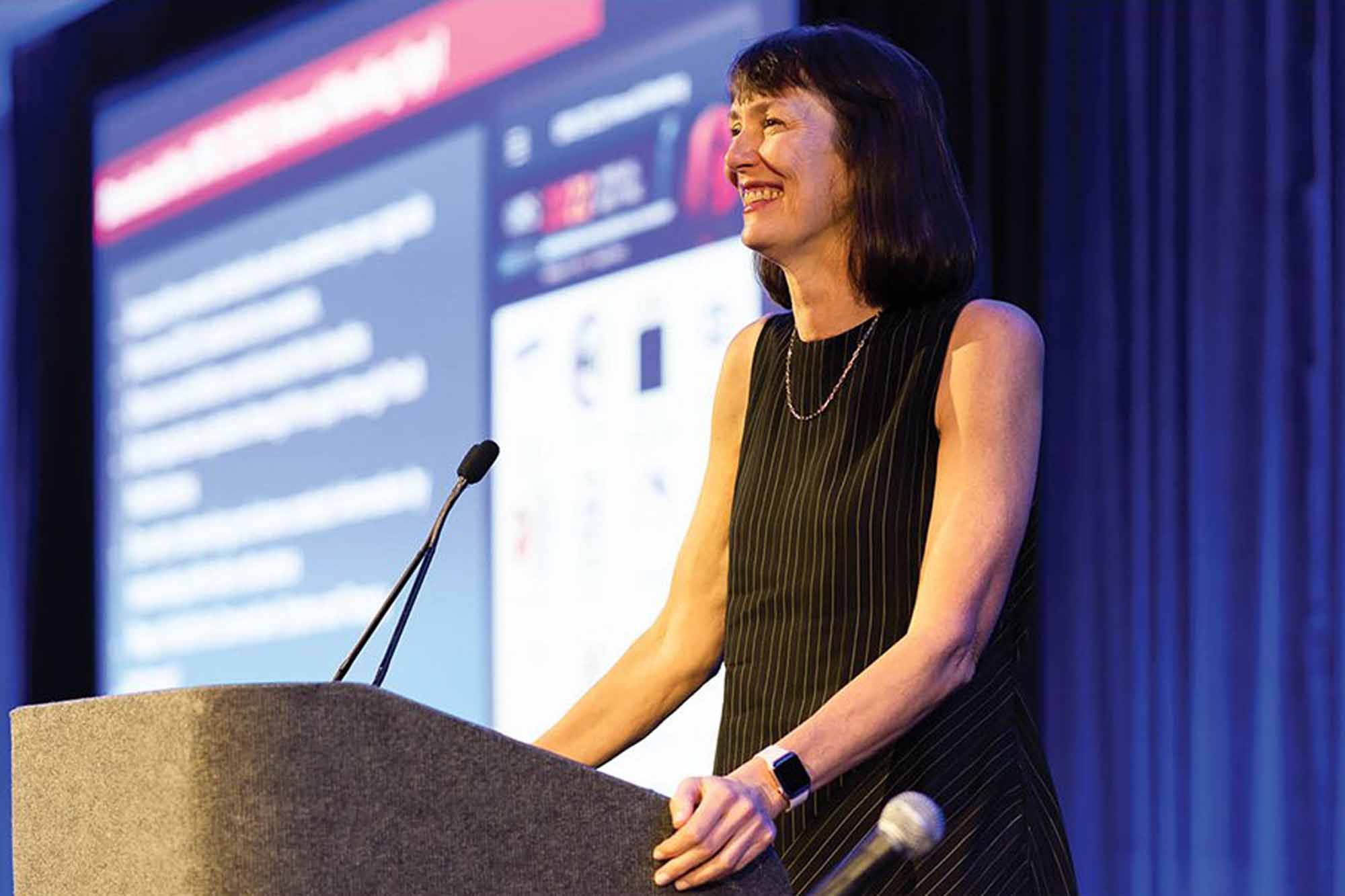 Marjolein van der Meulen stands at podium receiving Lissner award.