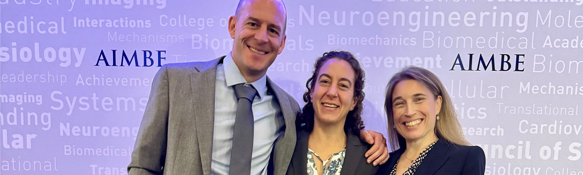 Faculty Iwijn De Vlaminck, Ilana Brito, and Krystyn Van Vliet stand together at AIMBE fellows induction.