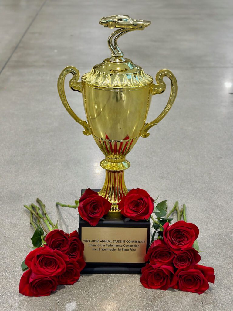 ChemE Car trophy with flowers.