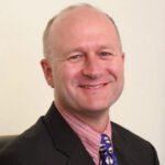 headshot of Dirk Swart aspect ratio 1-1