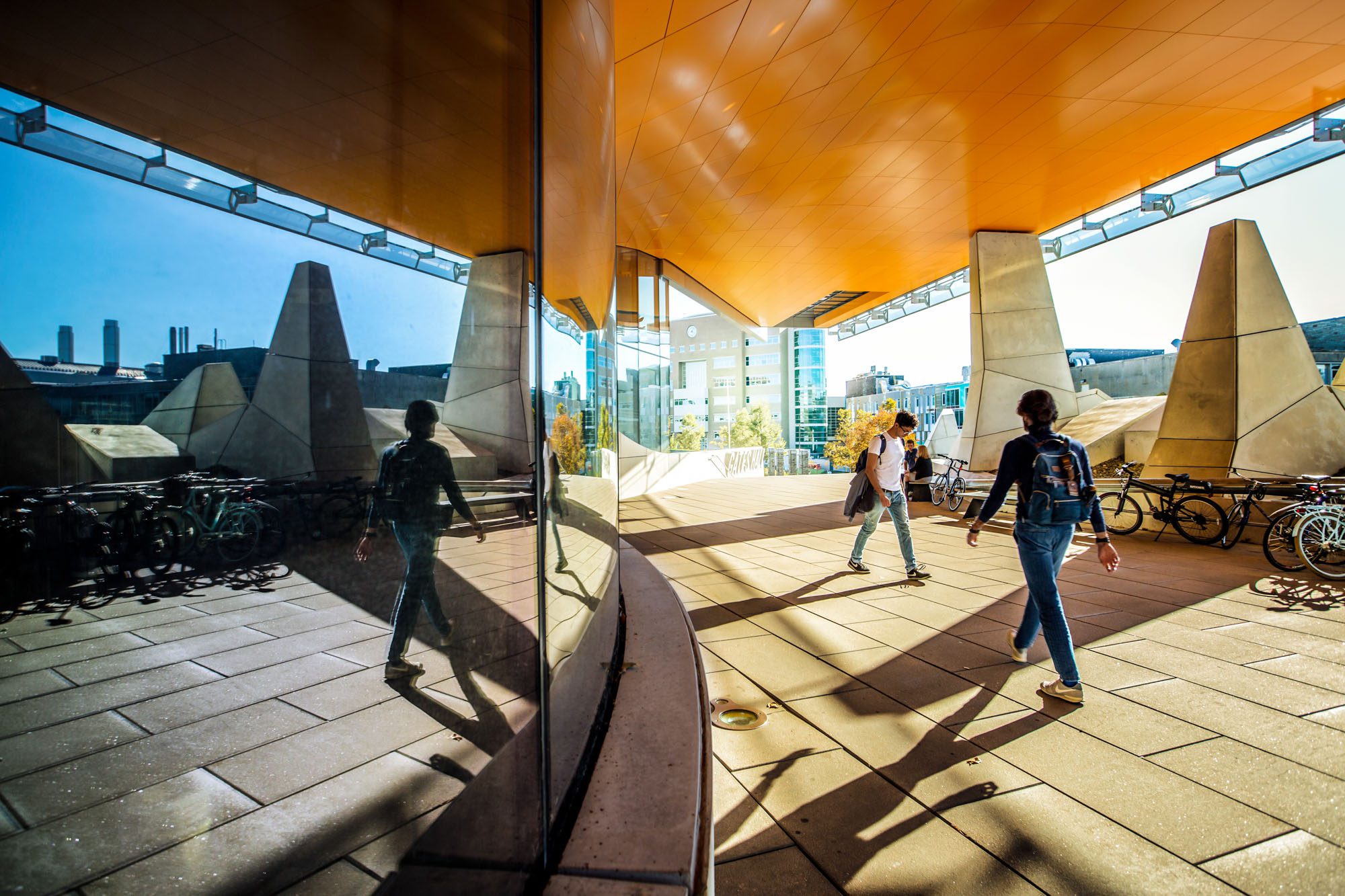 Computing and Information Science (CIS) students outside modern Gates Hall.