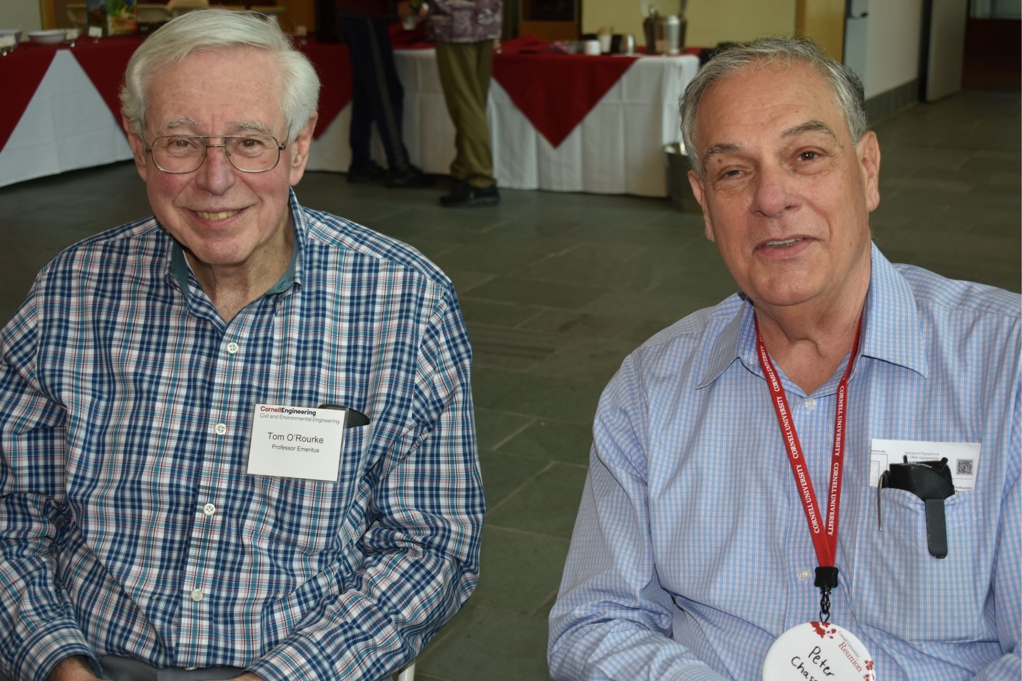 Two alumni sitting together during CEE reunion 2025