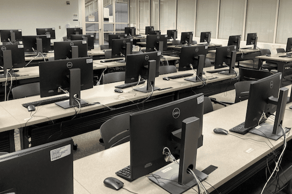 Computers in rows on tables