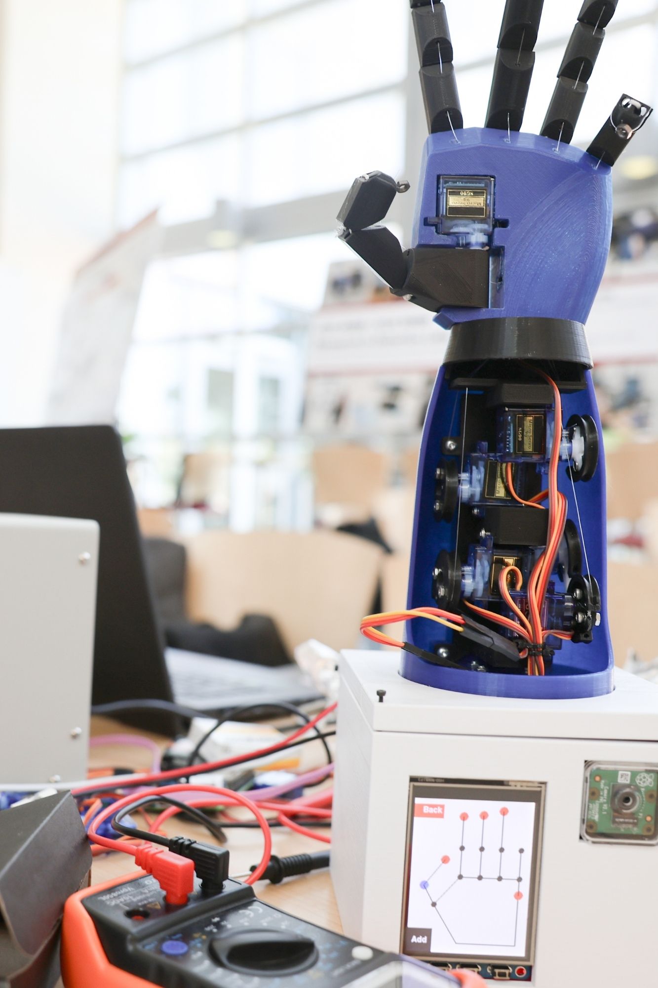 Robotic hand machine project shown at the ECE Robotics Showcase Spring 2024