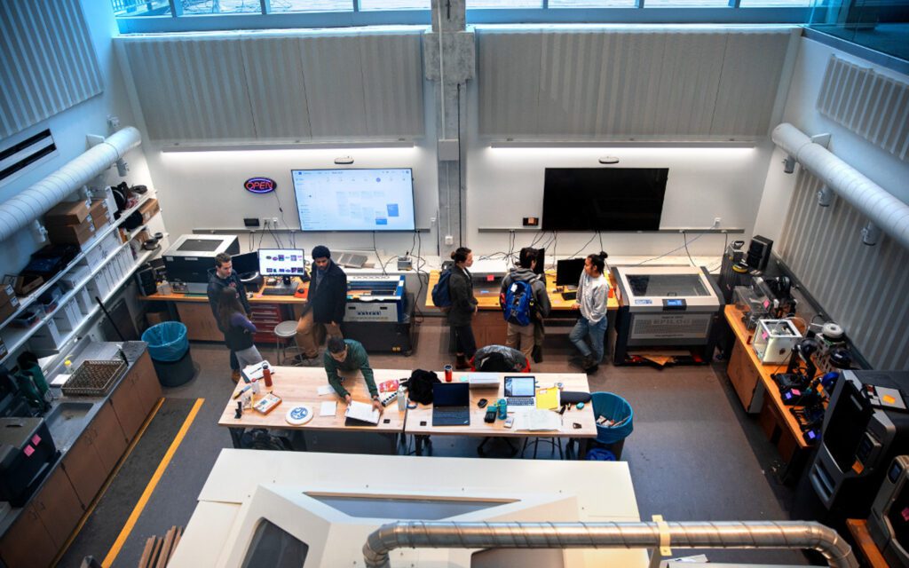 Students working in the Rapid Prototyping Lab in Upson Hall.