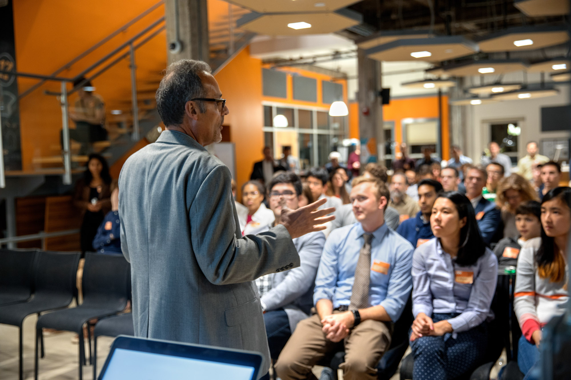 Professor Emmanuel Giannelis speaking to a group of students at a Networking at Rev Advancing University Technologies event