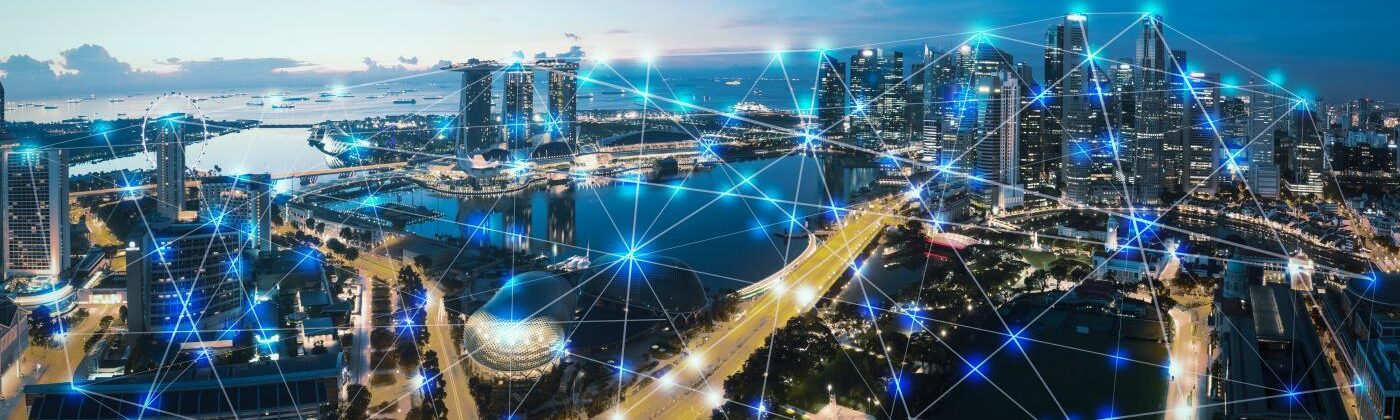 aerial view of city with lighted nodes and lines