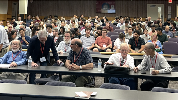 Attendees at the Ray Fulkerson Centennial Conference sitting in the auditorium at Phillips Hall.