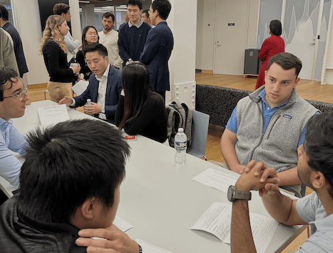 CFEM alumni talking with current CFEM students.