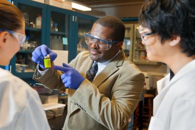 Lynden Archer, professor of chemical and biomolecular engineering, in the lab with students.