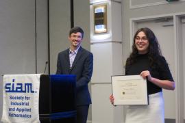 Andrea Minca, the Andrew Schultz ’36 PhD ’41 Sesquicentennial Fellow in ORIE, receives the SIAG/FME Early Career Award.   At left, Mike Ludkovski, chair of SIAG/FME.