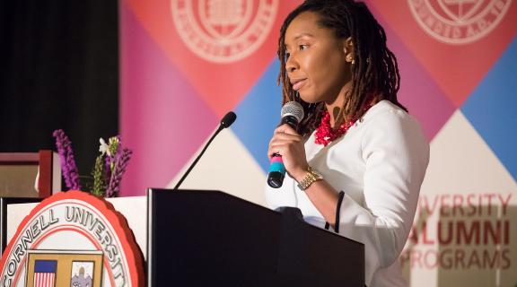 Cornell Engineering alumna giving a speech at a Diversity Alumni Programs event