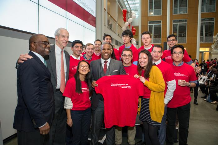 Robert Frederick Smith, ChemE '86 and students celebrating the dedication of the Smith School 
