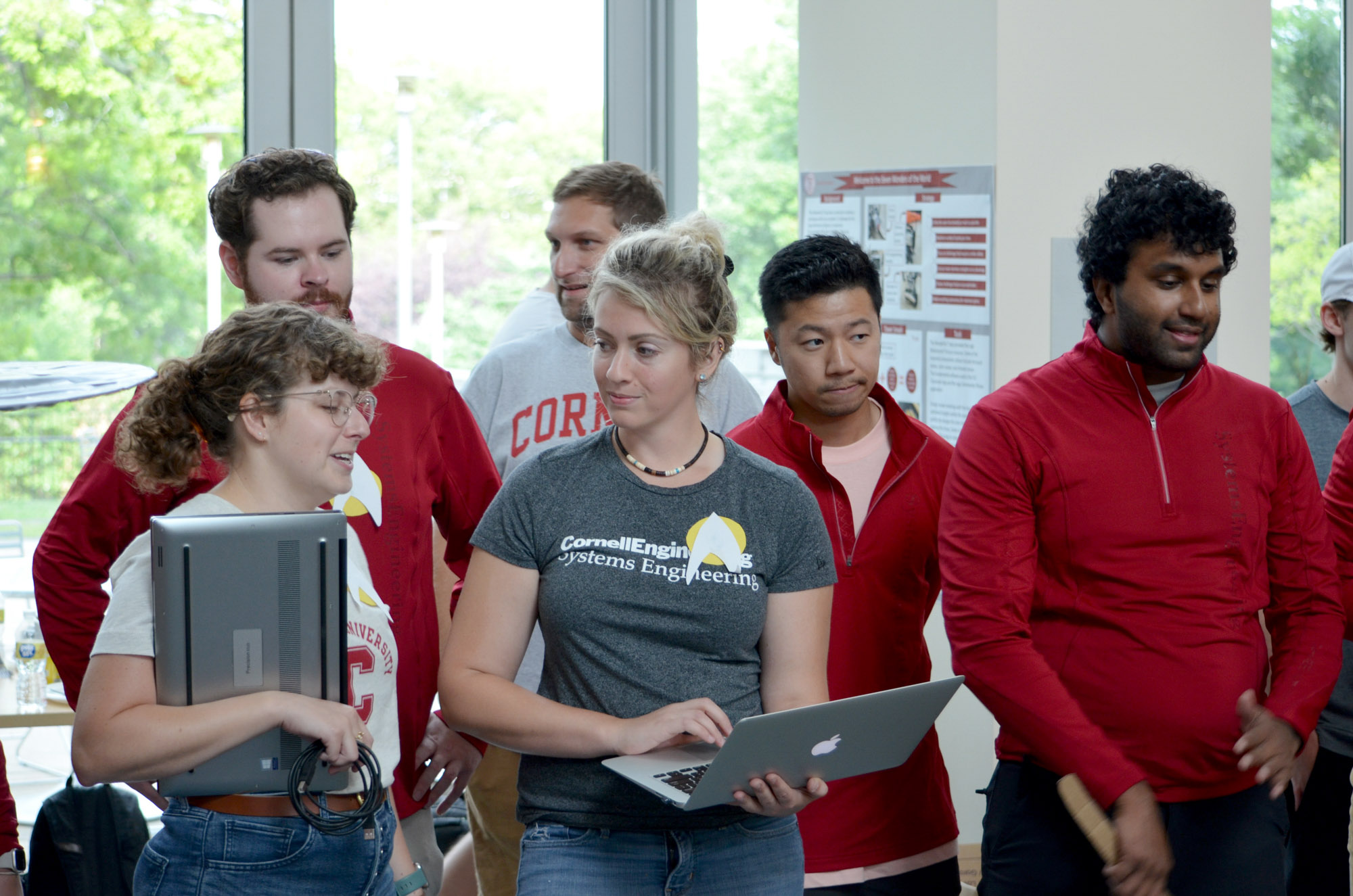 Six distance learning students watch the SYSEN 5920 competition in Duffield Hall