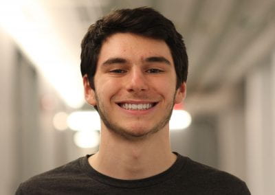 Male student up close, smiling