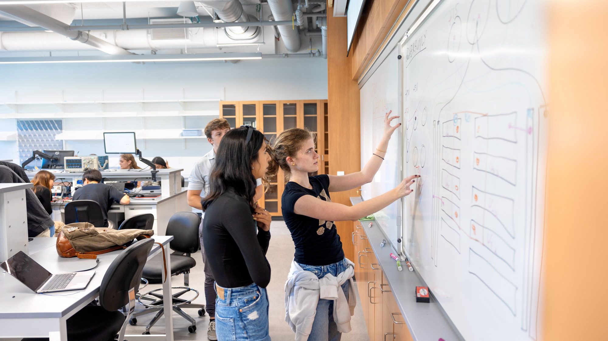 student explains to another student