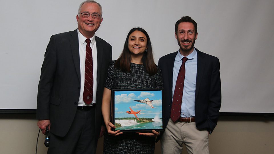 MAE's Sadaf Sobhani (middle) receives the American Institute of Aeronautics and Astronautics Niagara Frontier Section 2025 Young Professional of the Year Award.