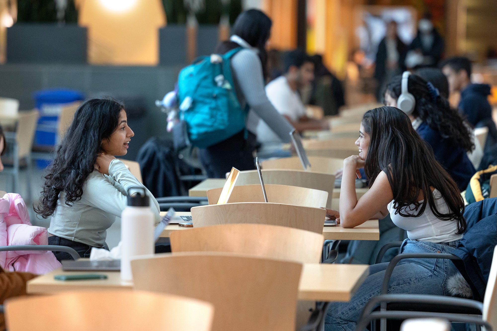 Students catch up and study between classes in the Duffield atrium.
