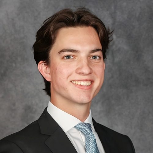 Headshot of Jackson Douglas on gray background